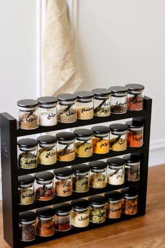 صورة  حامل جرات خشبي من 4 أدوار مع 28 جرة100  ملي -  طقم أسود 