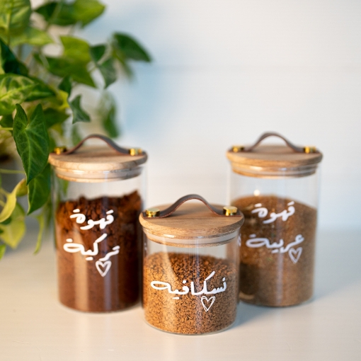 صورة طقم من 3 جرات بغطاء جلدي 