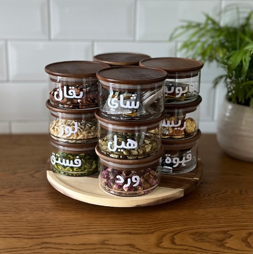 صورة  طقم ثلاث جرات  متعامدة  بغطاء خشبي داكن